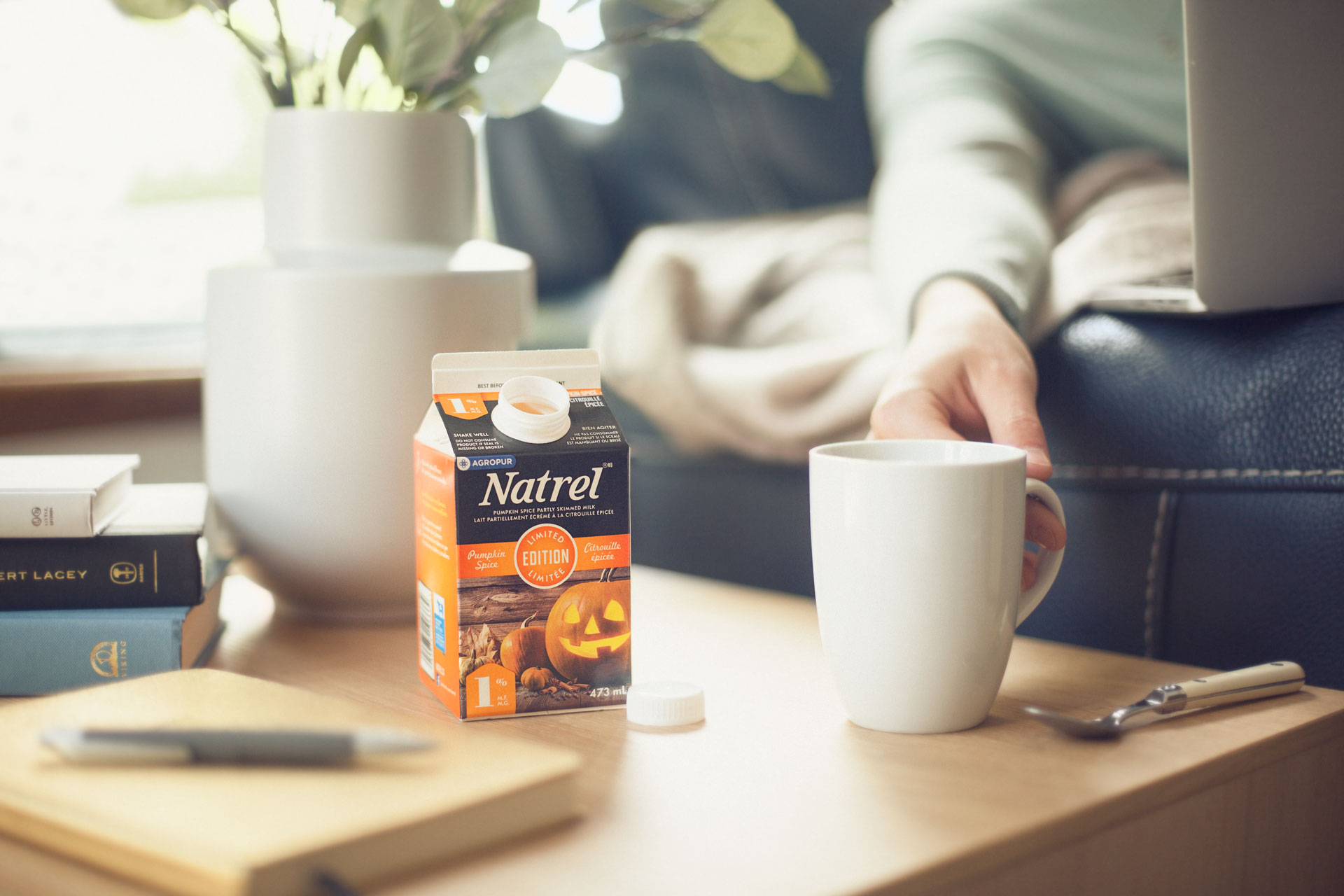 pumpkin spice latte milk on coffee table